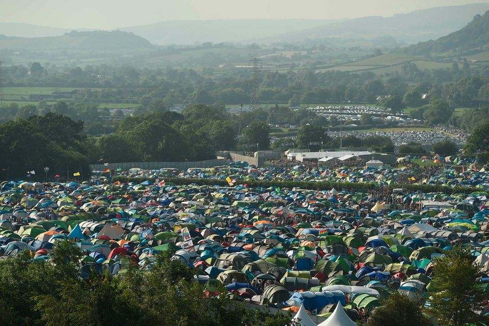Revellers attend the Glastonbury Festival of Music and Performing Arts on Worthy Farm near the village of Pilton in Somerset, South West England, on June 26, 2019. (Photo by Oli SCARFF / AFP)OLI SCARFF/AFP/Getty Images
