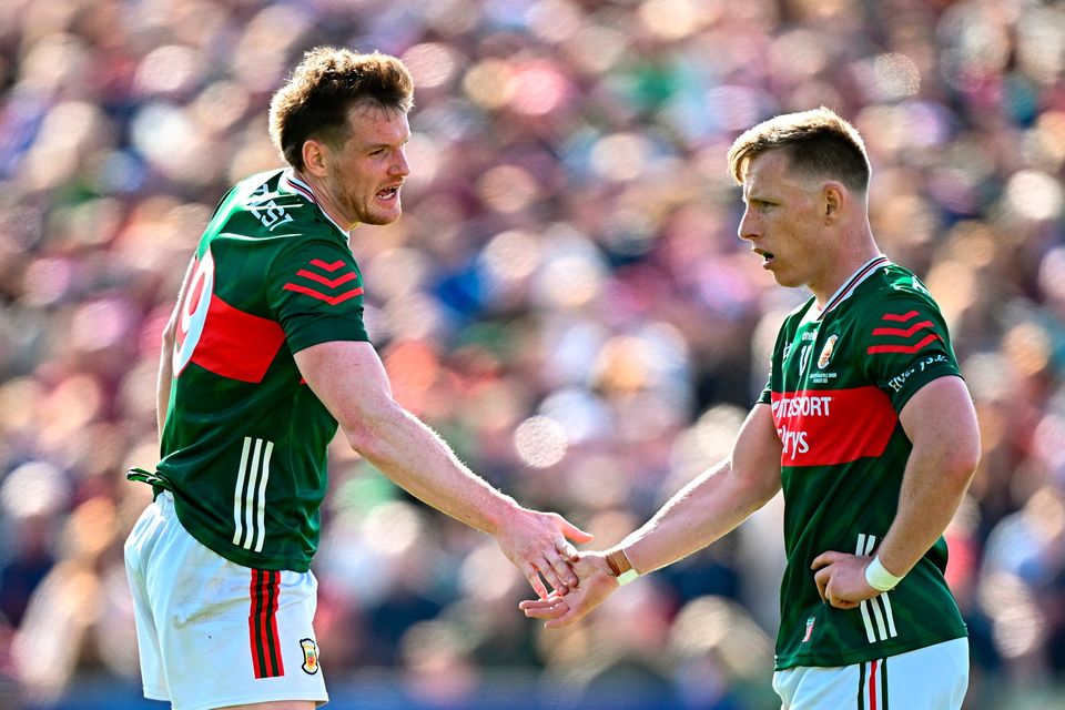 Mayo players Matthew Ruane and Ryan O'Donoghue after full-time in Castlebar. Photo: Seb Daly/Sportsfile