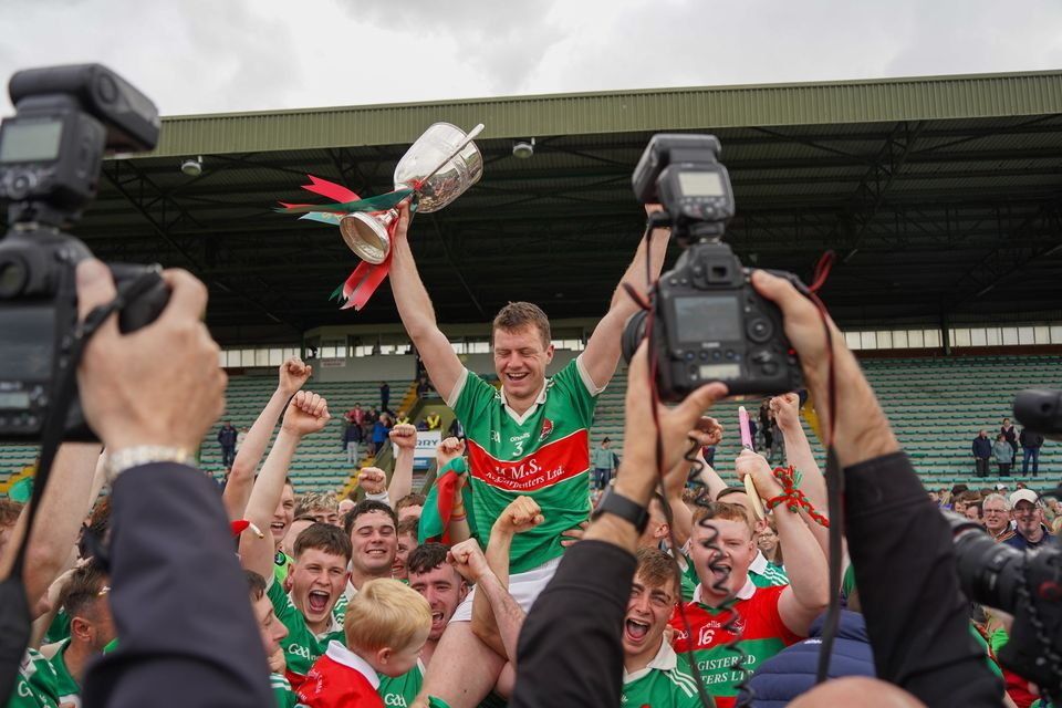 Crotta O'Neills captain Bill Keane celebrates with the Neilus Flynn Cup Photo by Mark O'Sullivan