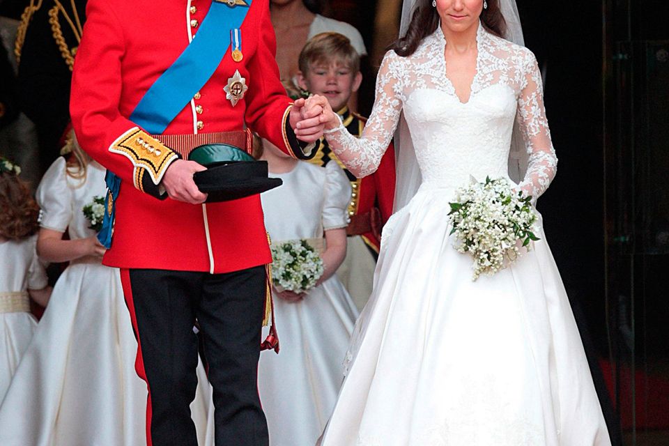File photo dated 29/04/2011 of Duke and Duchess of Cambridge emerging from Westminster Abbey after the wedding ceremony
