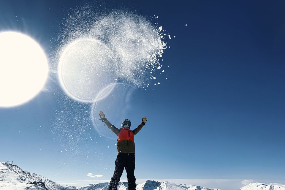 A skier on top of a mountain on a gloriously sunny day in Borovets, Bulgaria. Photo: Getty