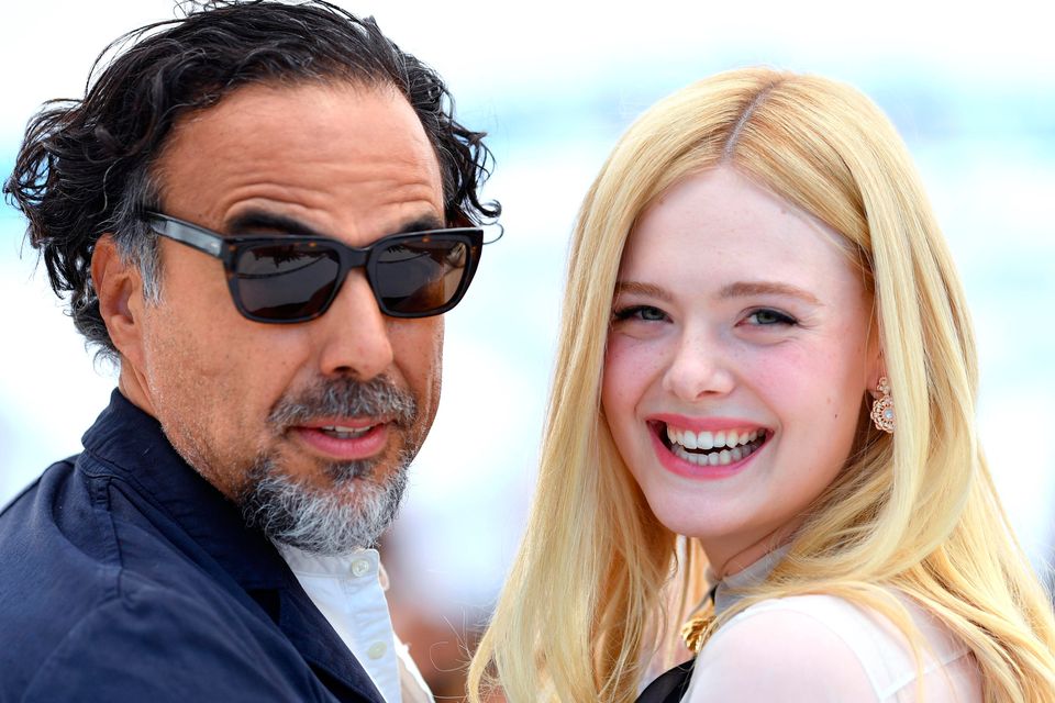 Jury duty: Alejandro González Iñárritu and fellow Cannes jury member actress Elle Fanning in Cannes. Photo: Getty