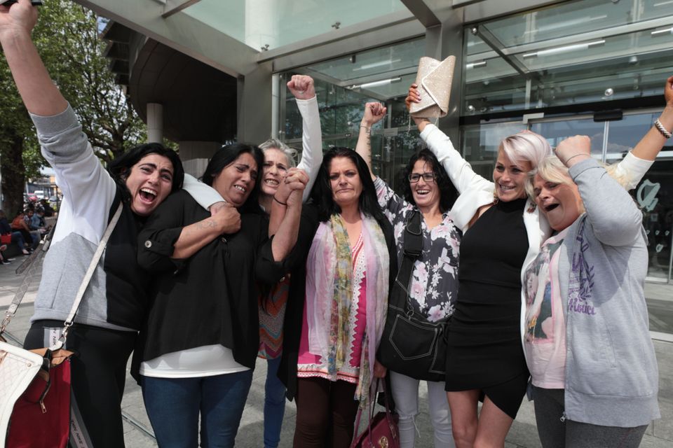 Daughters of sick James O’Reilly embrace outside court after he was jailed for 20 years. Photo: Collins