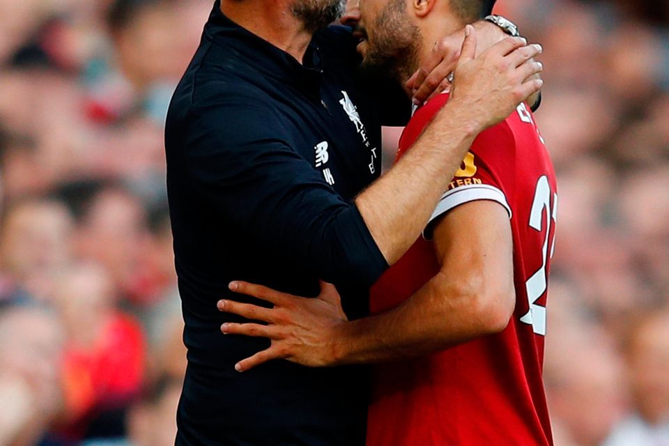 Liverpool's Emre Can embraces manager Jurgen Klopp