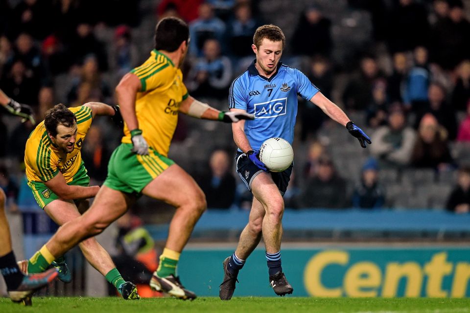 Jack McCaffrey races past Donegal's Michael Murphy on his way to score Dublin's second goal in the 63rd minute