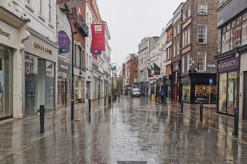 Footfall in Dublin's city centre has decreased dramatically since Covid-19. The office and retail sectors are expected to see falls in both rents and capital values during the year. Photo: Collins/Gareth Chaney