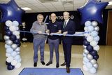 thumbnail: James and Michael Lawrence with Leo Clancy CEO Enterprise Ireland cut the ribbon at Lawrence Engineering.