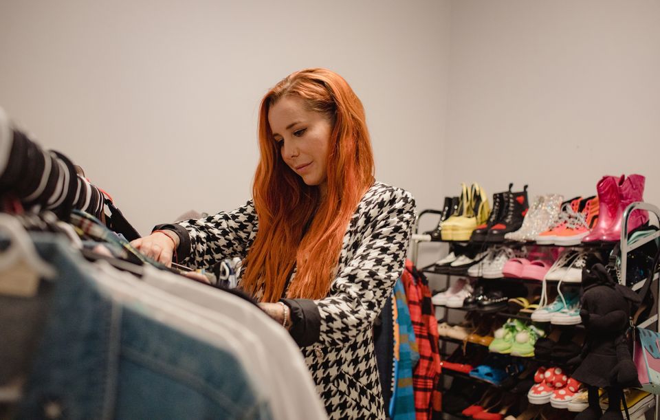 Leslie Kay, creator of DisneyBound, peruses her closet of Disney fashion in Waterloo, Canada. Photo for The Washington Post by Chloe Ellingson