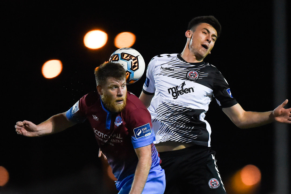 Chris Mulhall of Drogheda United in action against Warren O'Hora of Bohemians