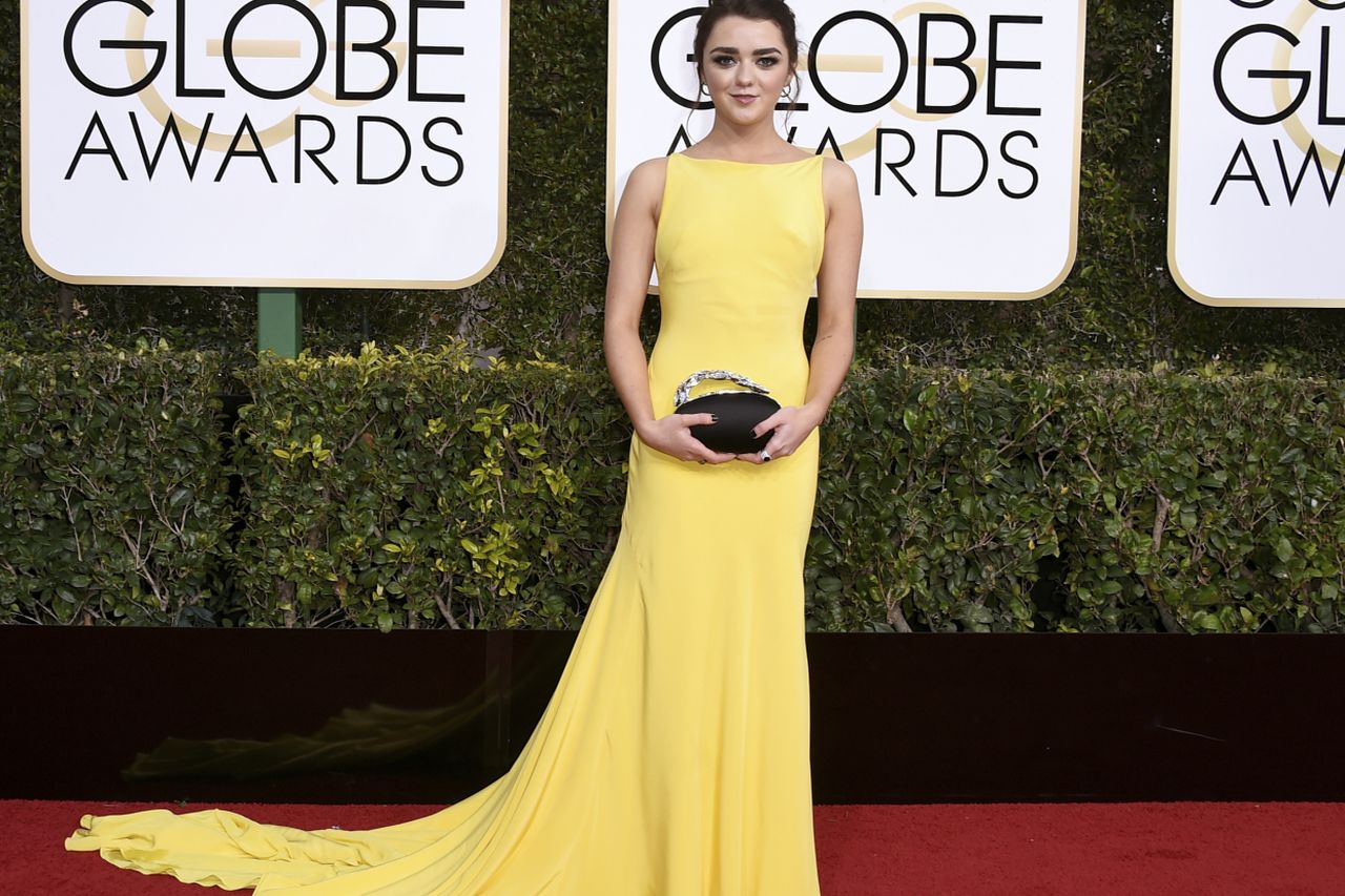 Maisie Williams dazzles in yellow on Golden Globes red carpet | Irish  Independent