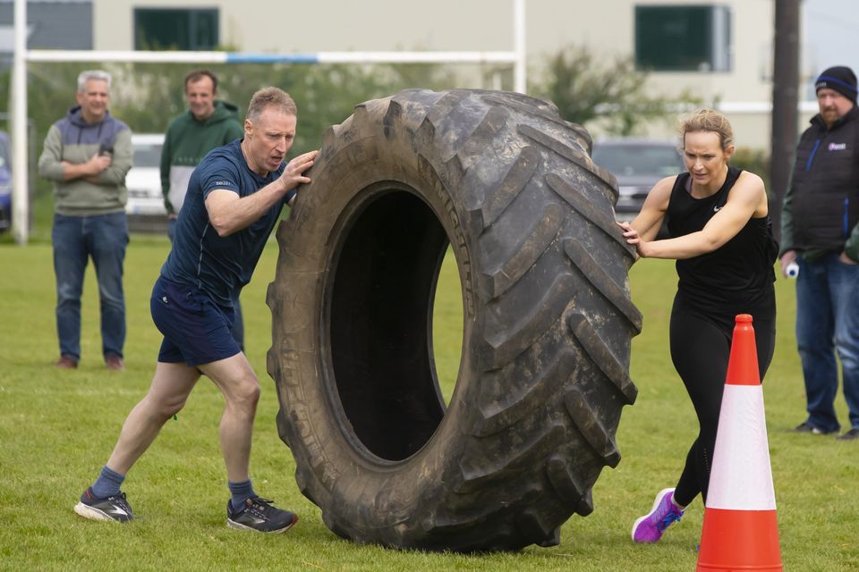 07/05/2023. Pictured at Gusserane Fittest Family are Paddy Reville and Siobhan Kehoe on the obstacle course.. Photograph: Patrick Browne