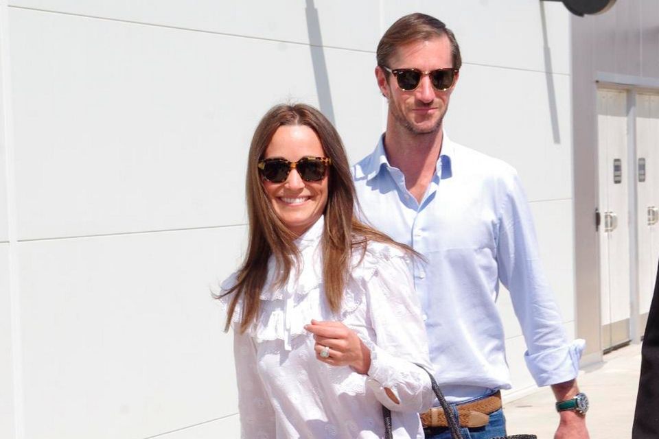 Pippa Middleton and new husband James Matthews arrive in Darwin on the next leg of their multi-stop honeymoon. Picture: MEGA