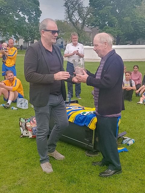 Paddy Harris/Shane Surplus Presentations at People's Park Bray. Timmy Harris makes the presentation to Paddy Harris in honour of his years of service marking pitches