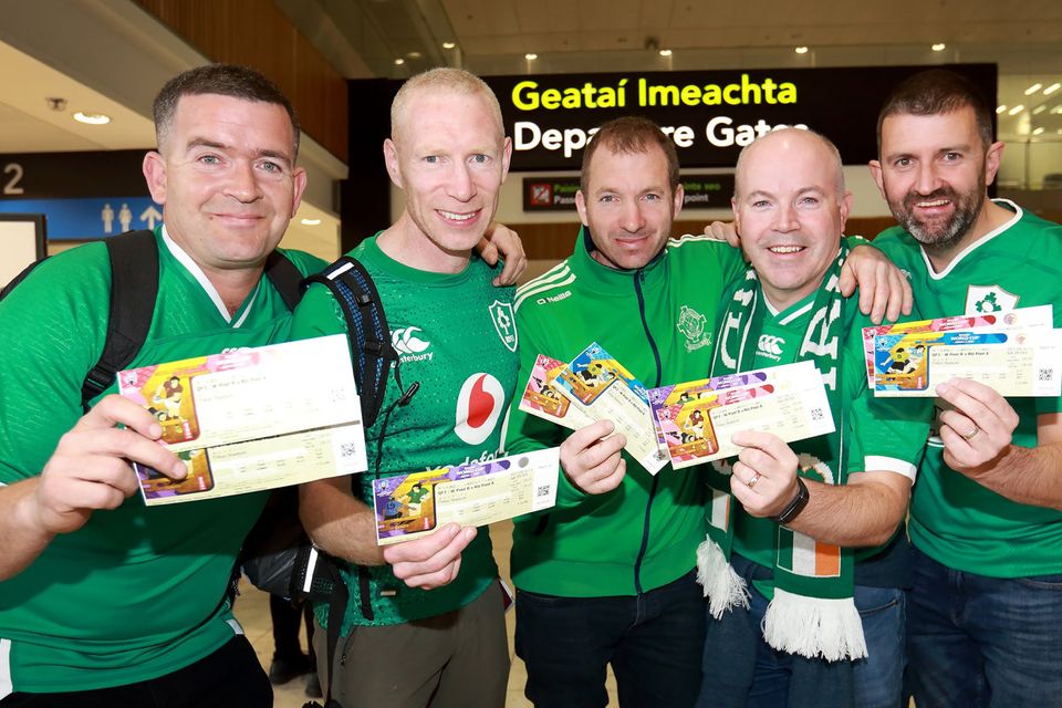 Jetting off: Rugby fans Liam McCarthy, Conor Collins, Finny Collins, Karl Slyne and Kevin Crowley, all from Cork, at Dublin Airport on the way to Japan with their tickets for Ireland v New Zealand. Photo: Frank McGrath