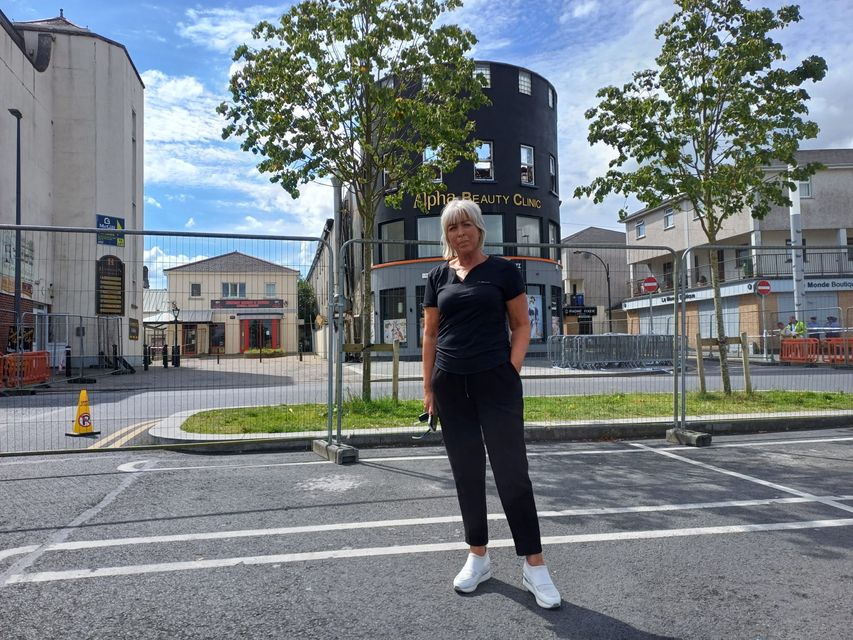 Longford business owner Pauline Coady Belton at the scene of Sunday morning's fire.