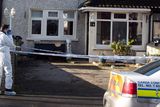 thumbnail: Members of the Gardai at the scene at Harty Avenue in Walkinstown Dublin were a 64-year-old victim was shot dead at his home a murder investigation is under way