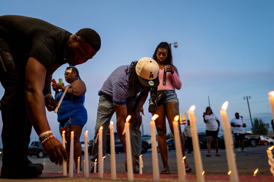 The Pugh and Elkins families gather while grieving the death of family members. Photo: Getty