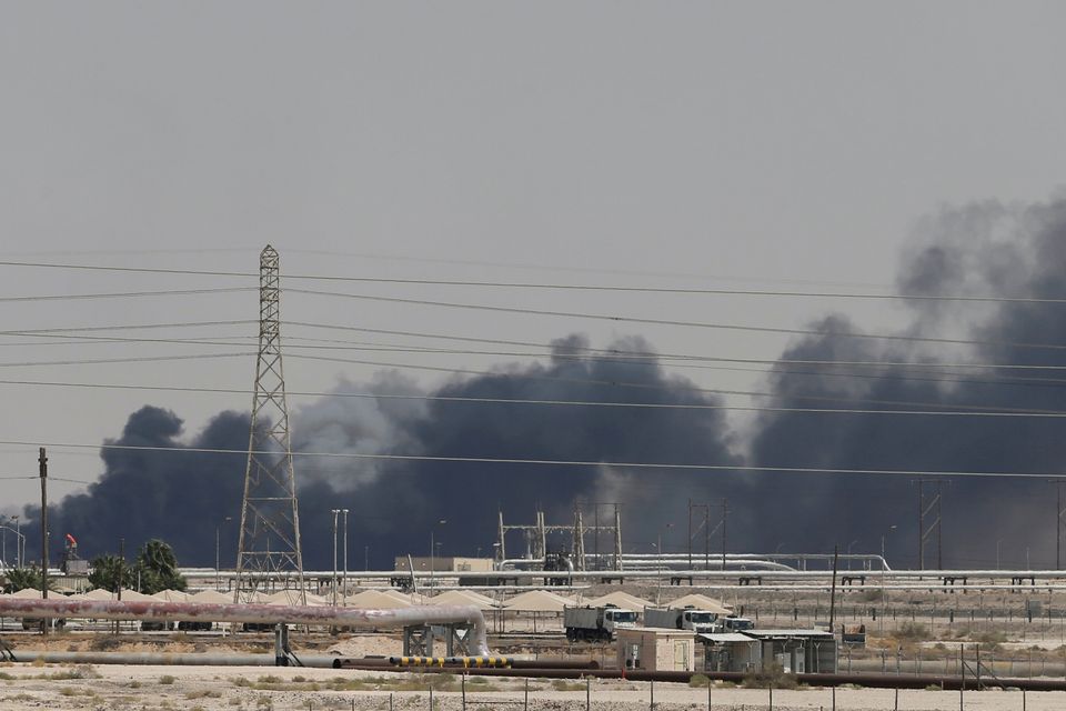 Aftermath: Smoke is seen at the facility in the city of Abqaiq, Saudi Arabia, after it was attacked. Photo: Reuters