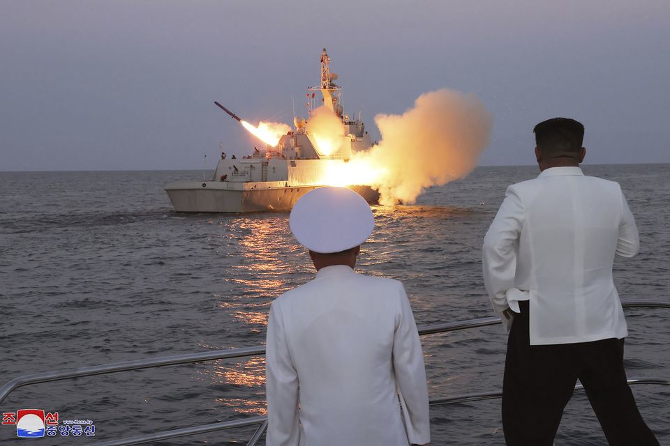 Kim Jong Un, right, observes what North Korea says was the test-firing of strategic cruise missiles. The content of this image is as provided and cannot be independently verified. (Korean Central News Agency/Korea News Service via AP)