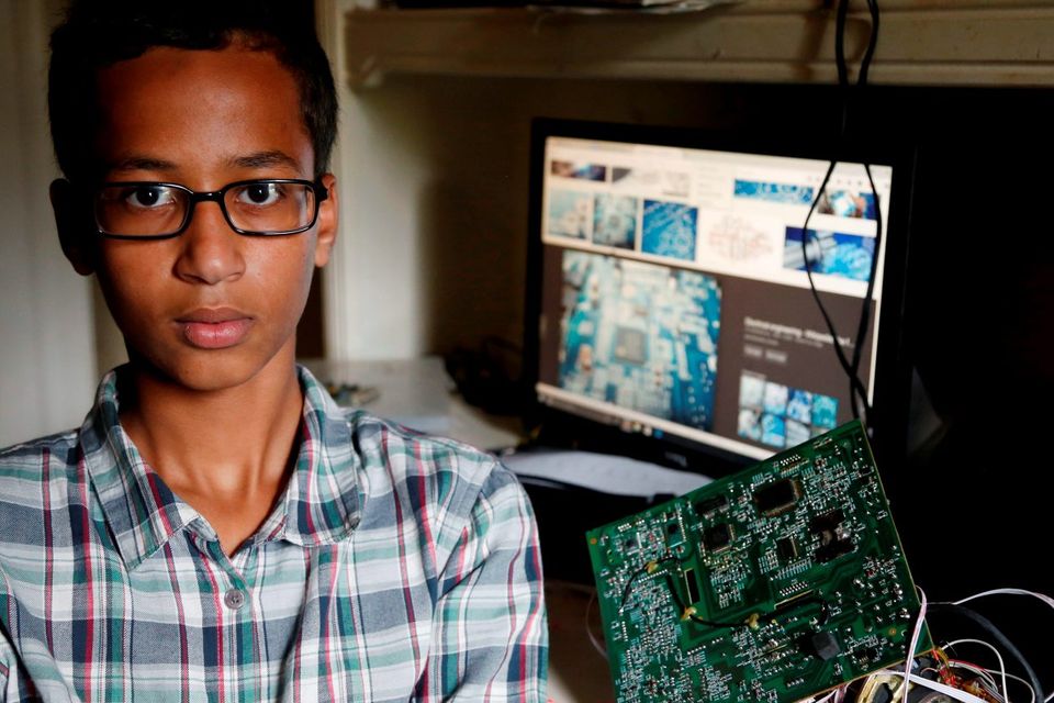 Irving MacArthur High School student Ahmed Mohamed, 14, poses for a photo at his home in Irving, Texas on Tuesday, Sept.  15, 2015. Mohamed was arrested and interrogated by Irving Police officers on Monday after bringing a homemade clock to school. Police don't believe the device is dangerous, but say it could be mistaken for a fake explosive. He was suspended from school for three days, but he has not been charged. (Vernon Bryant/The Dallas Morning News via AP) MANDATORY CREDIT; MAGS OUT; TV OUT; INTERNET USE BY AP MEMBERS ONLY; NO SALES