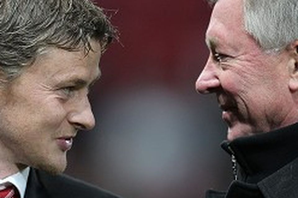Sir Alex Ferguson, right, did not warn Ole Gunnar Solskjaer, left, off the Cardiff job by, according to the Norwegian