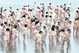 thumbnail: Volunteers pose in Dublin's Docklands for the photoshoot by Spencer Tunick