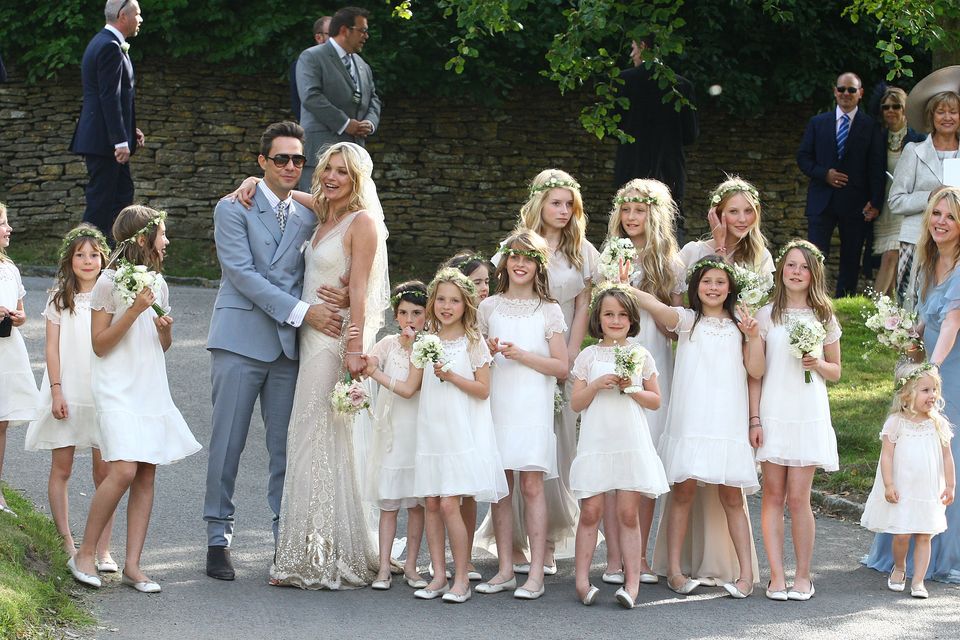 Kate Moss and Jamie Hince outside St Peter's church after their wedding ceremony on July 1, 2011 in [Southrop], England.
