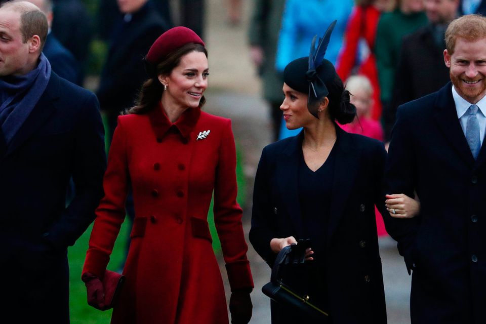 Prince William, Duke of Cambridge and Catherine, Duchess of Cambridge along with Prince Harry, Duke of Sussex and Meghan, Duchess of Sussex arrive at St Mary Magdalene's church for the Royal Family's Christmas Day service on the Sandringham estate in eastern England, Britain, December 25, 2018. REUTERS/Hannah McKay