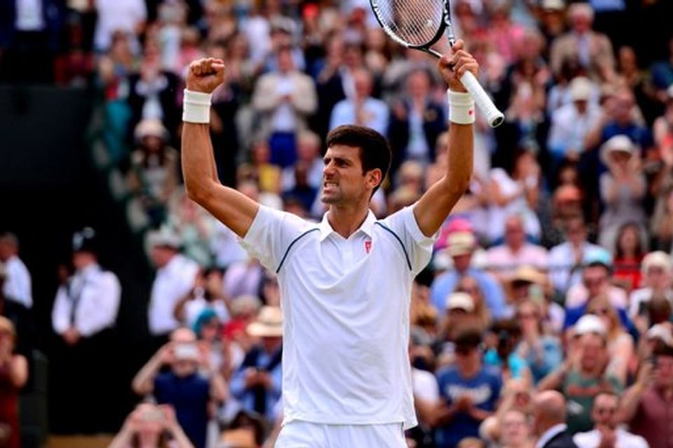 Novak Djokovic celebrates beating Kevin Anderson
