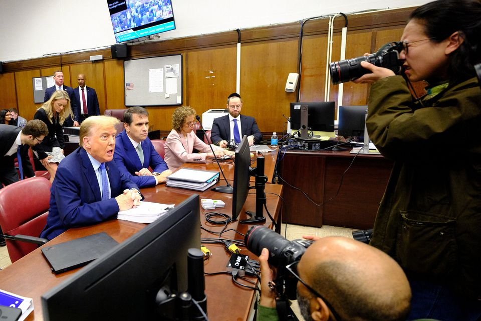 Former US president Donald Trump sits in the courtroom at Manhattan criminal court in New York. Photo: Reuters
