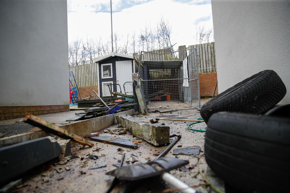 The aftermath of the home in west Belfast after a car crashed into the garden. Picture: Aodhan Roberts/Belfast Telegraph.