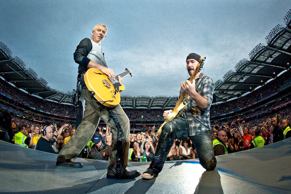Adam Clayton and The Edge perform on stage for the second night of U2's 360 Degrees World Tour in their home town at Croke Park on July 25, 2009 in Dublin, Ireland.