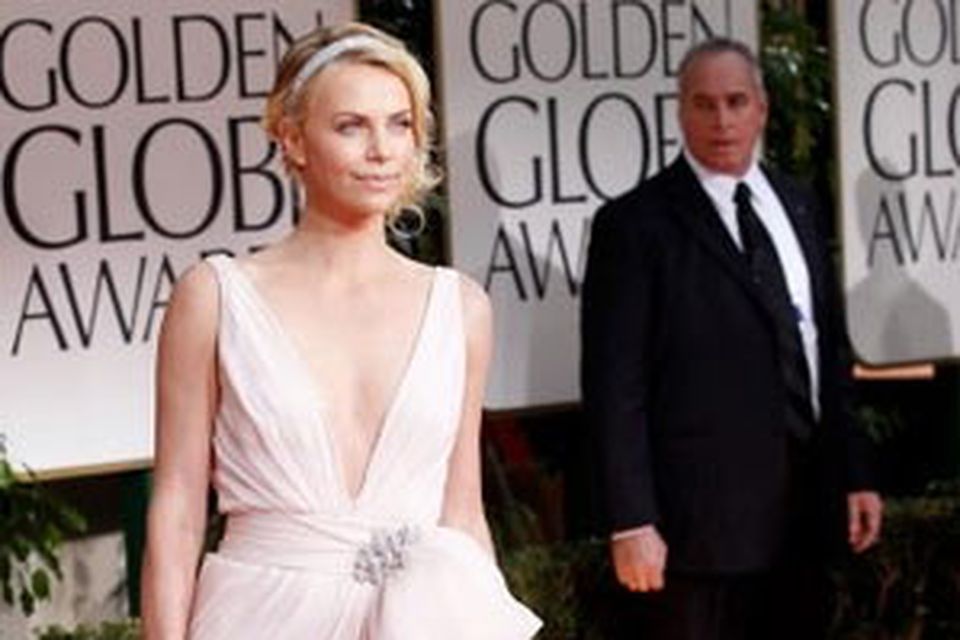 Charlize Theron looked stunning in this pale pink Dior gown.