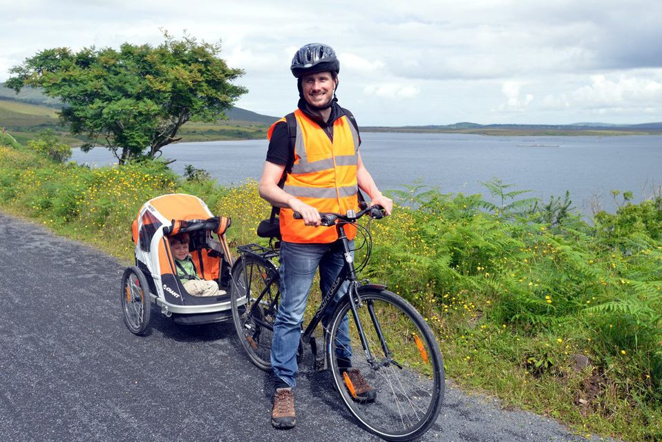 Pól Ó Conghaile gives a chauffeur service to his son Sam on the Great Western Greenway