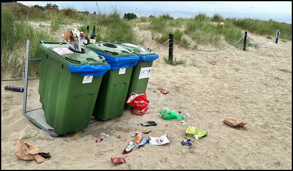 Overflowing bins at Burrow Beach in Sutton. Pic: Steve Humphreys