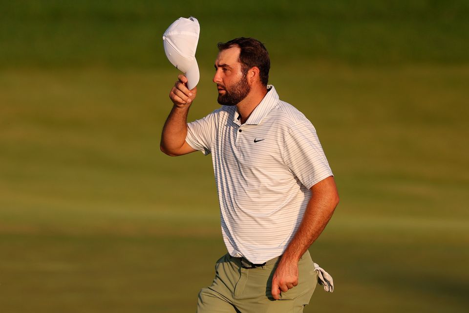 Scottie Scheffler gestures to the crowd during his first round at the 2024 PGA Championship at Valhalla Golf Club.