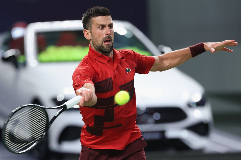 SHANGHAI, CHINA - OCTOBER 08: Novak Djokovic of Serbia plays a shoot in the Men's singles third round match against Flavio Cobolli of Italy on Day 9 of 2024  Shanghai Rolex Masters at Qi Zhong Tennis Centre on October 08, 2024 in Shanghai, China. (Photo by Lintao Zhang/Getty Images)