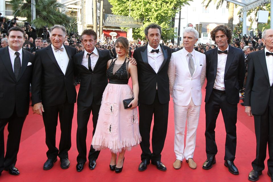 Irish actor Simon Delaney, US actor Judd Hirsch, US actor Sean Penn, Irish actress Eve Hewson, Italian director Paolo Sorrentino, Scottish born musician David Byrne, Israeli actor Liron Levo and German actor Heinz Lieven pose  on the red carpet before the screening of "This Must Be The Place" presented in competition at the 64th Cannes Film Festival on May 20, 2011 in Cannes.