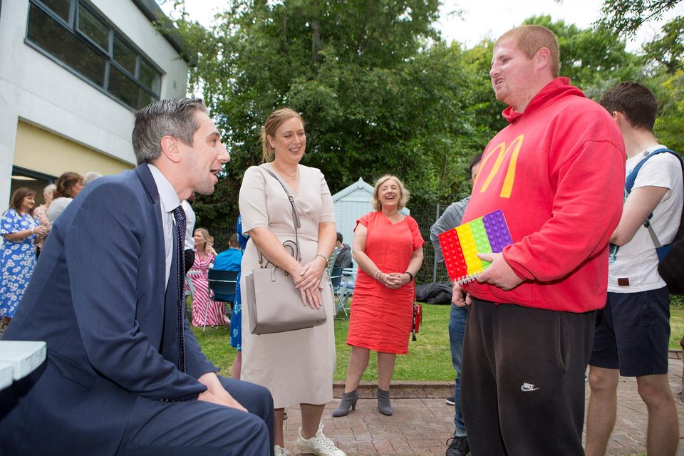 Minister Simon Harris chats with Bobby O'Brien during a visit to the National Learning Centre in Bray