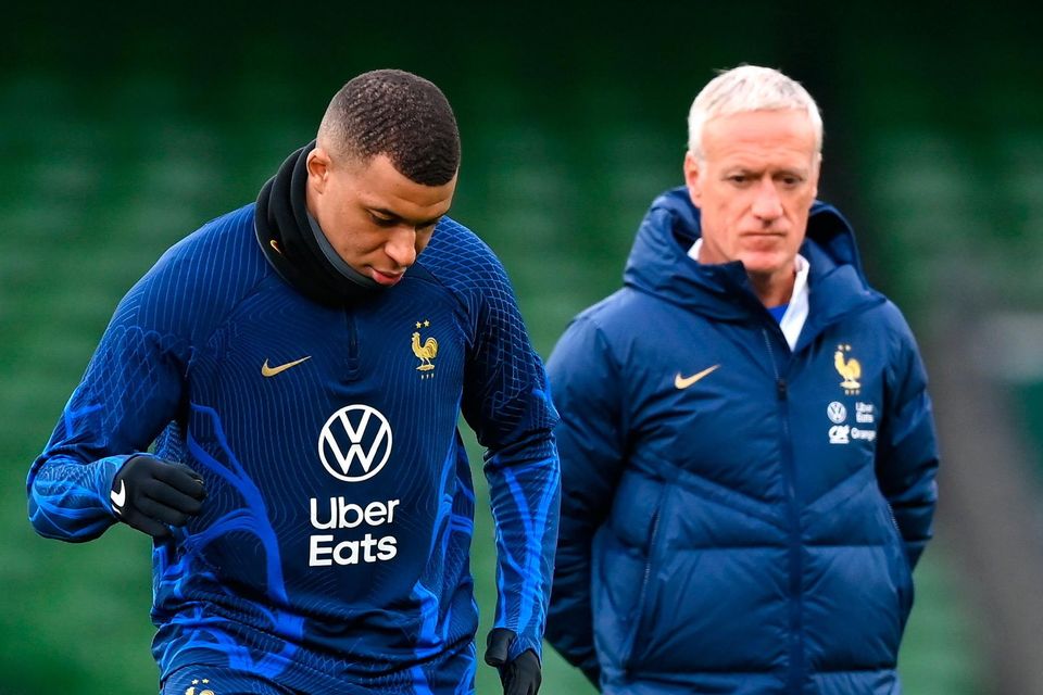 Kylian Mbappe (left) and Didier Deschamps claim it will be no walk in the park for France against Ireland at the Aviva tonight. Photo: Sportsfile