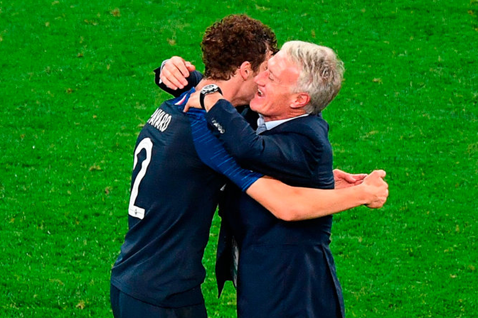 Delighted French coach Didier Deschamps hugs defender Benjamin Pavard after the victory against Belgium. Photo: Getty Images