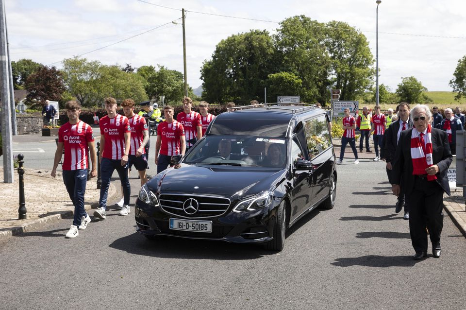 Tommie Gorman's funeral procession flanked by a guard of honour from Sligo Rovers arriving at Our Lady Star of the Sea Church in Ransboro, Sligo. Photo: Carl Brennan