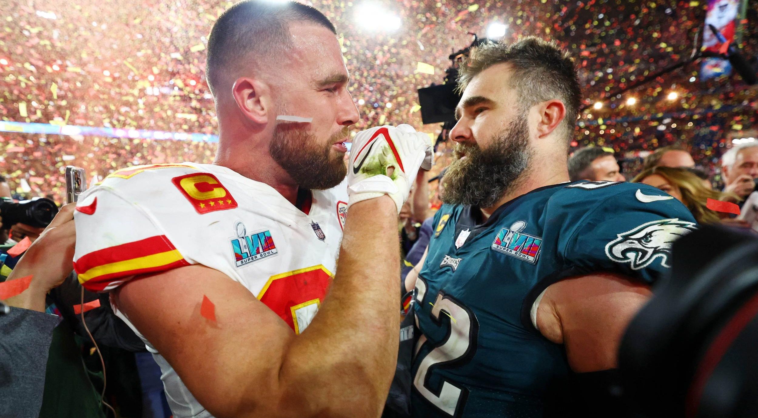 5) Kelce brothers embrace after playing on opposing sides of an