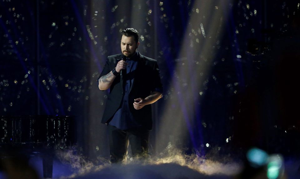 Carl Espen, representing Norway, performs the song "Silent Storm" during the second semi-final at the 59th annual Eurovision Song Contest at the B&W Hallerne in Copenhagen