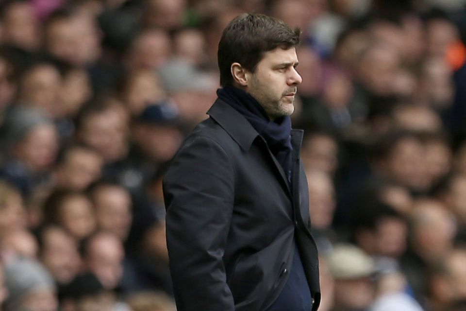 Mauricio Pochettino, dressed for touchline duty, says he trusts Tottenham's new signing Serge Aurier