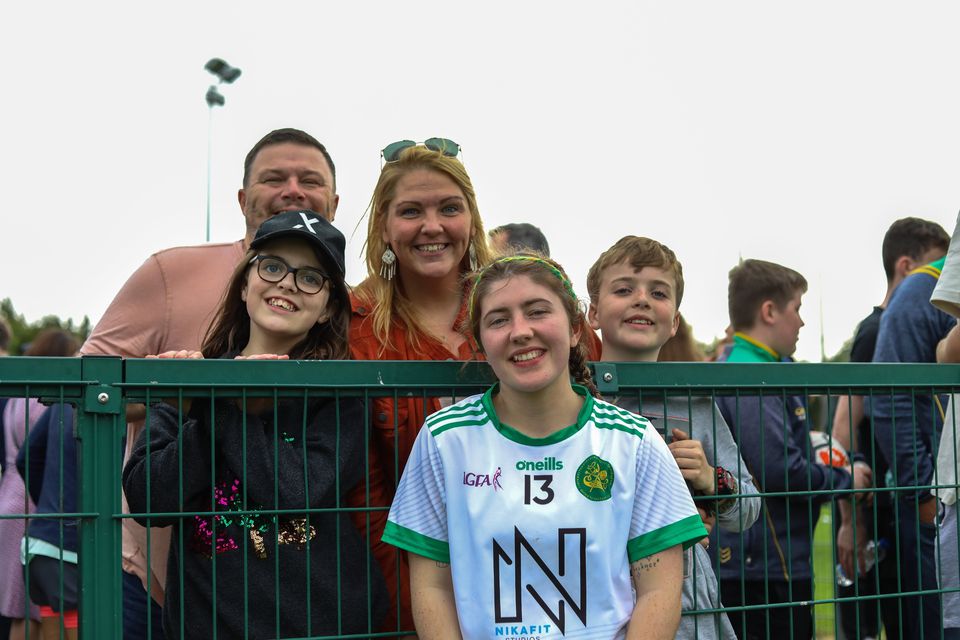 Kilcoole's Robyn Rooney with her proud family in Bray Emmets GAA Club last weekend. 