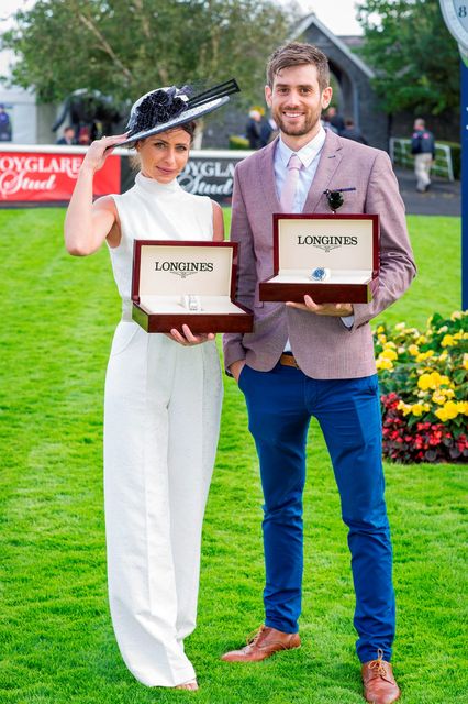 Anna McGuire, who won the Most Elegant Woman prize, and Chris Bonini, winner of the Most Elegant Man award, at the Longines Irish Champions Weekend at the Curragh racecourse