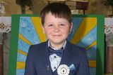 thumbnail: Darragh Doyle, Castledockrell NS was the only pupil to make his First Holy Communion this year.