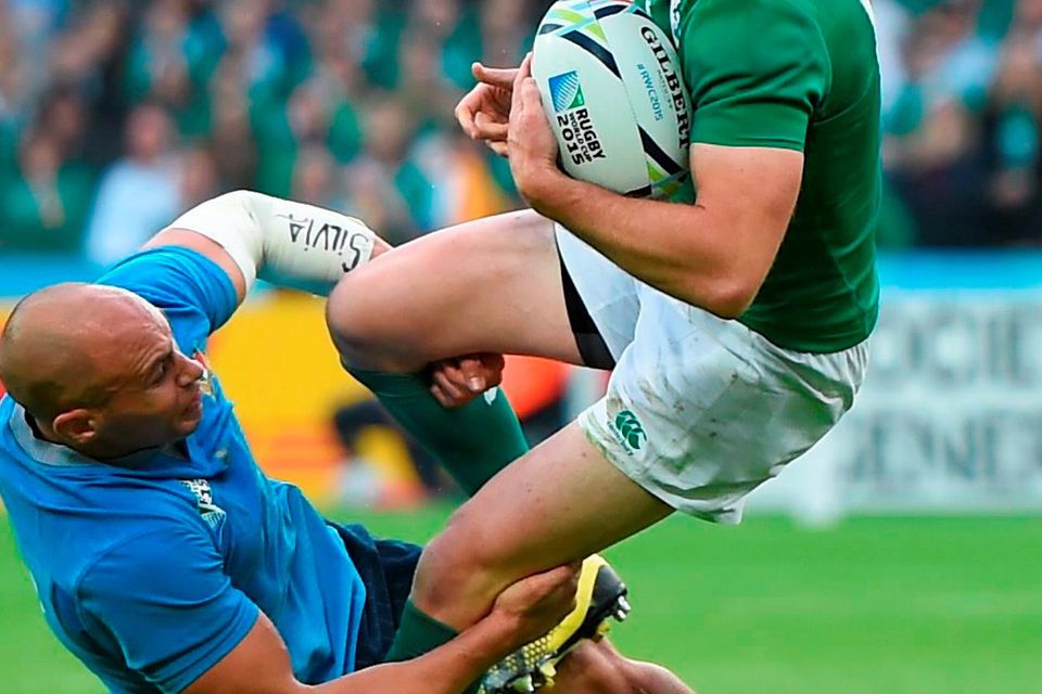 4 October 2015; Jonathan Sexton, Ireland, is tackled by Sergio Parisse, Italy. 2015 Rugby World Cup, Pool D, Ireland v Italy. Olympic Stadium, Stratford, London, England. Picture credit: Stephen McCarthy / SPORTSFILE