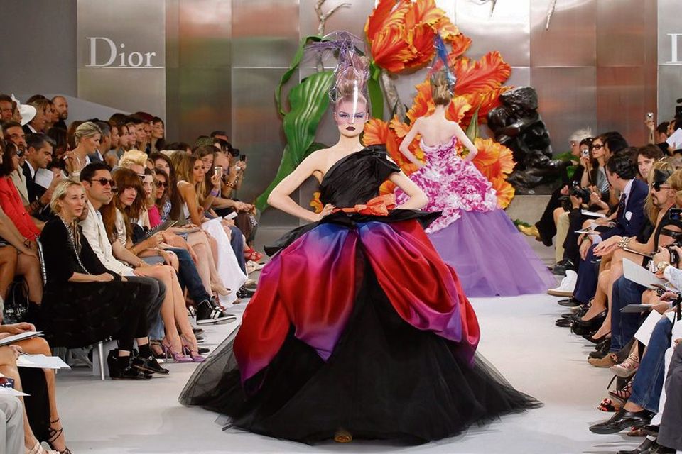 No, it is not acceptable to wear Dior, John Galliano